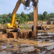 Sheet pile driving for retaining wall works